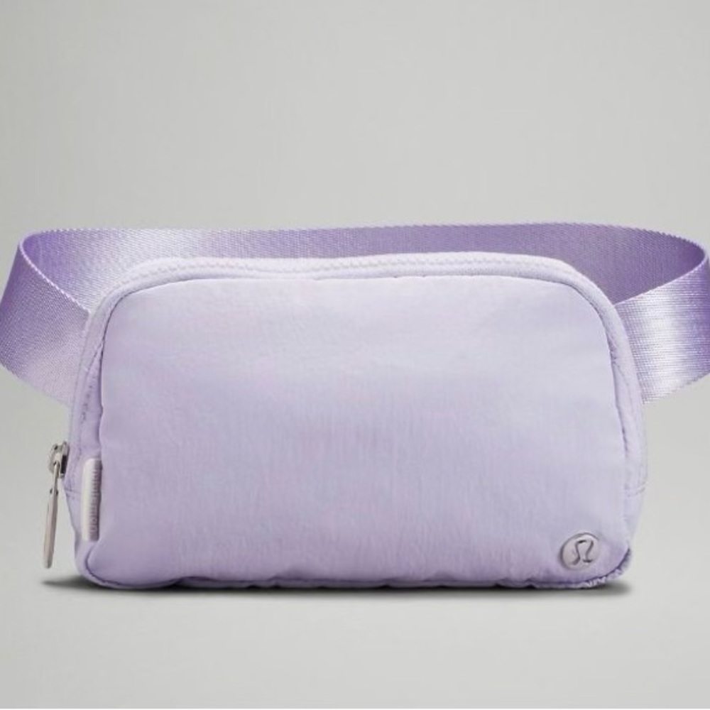 Brand new Lululemon everywhere belt bag 1L in
lavender fog with tag.